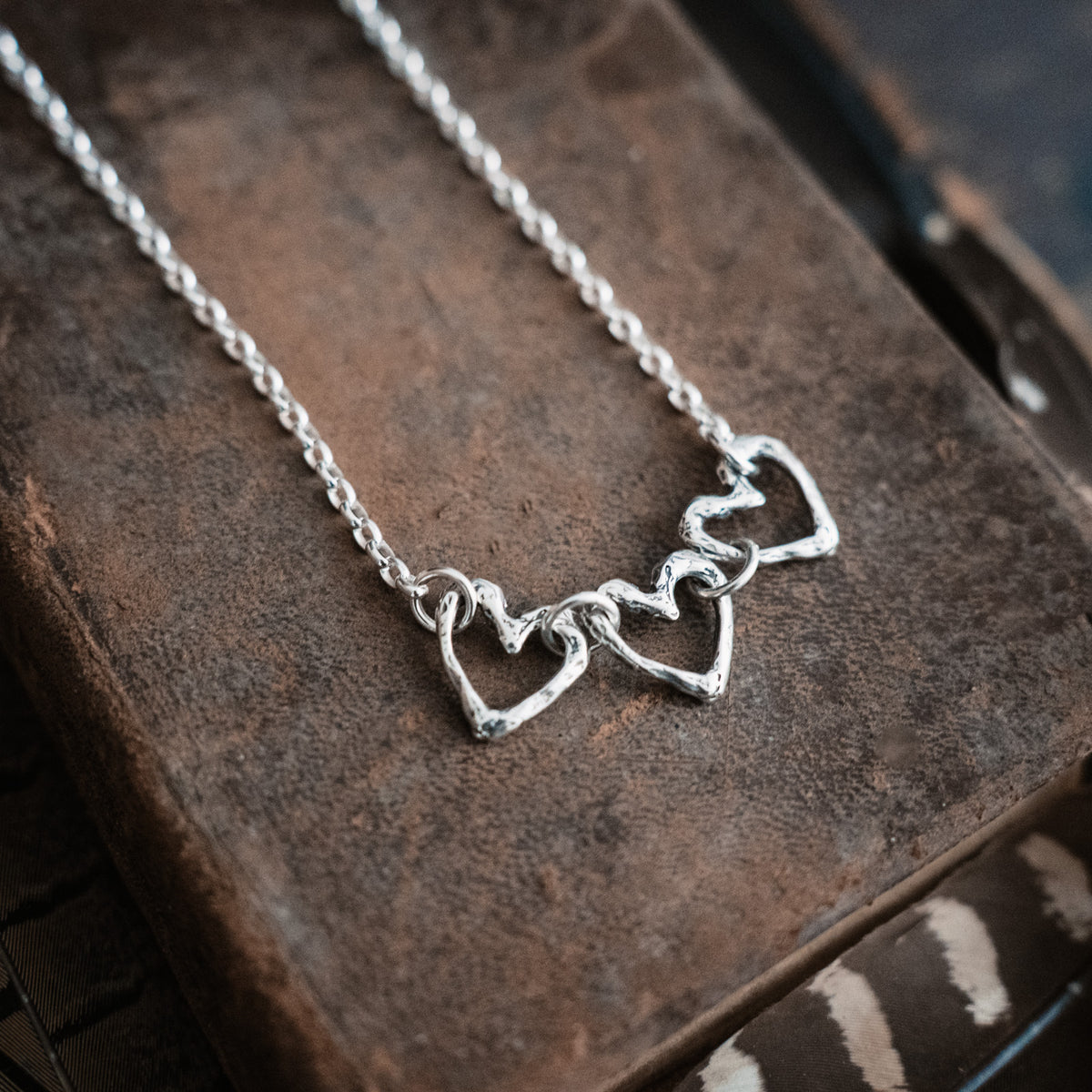 silver necklace with hearts