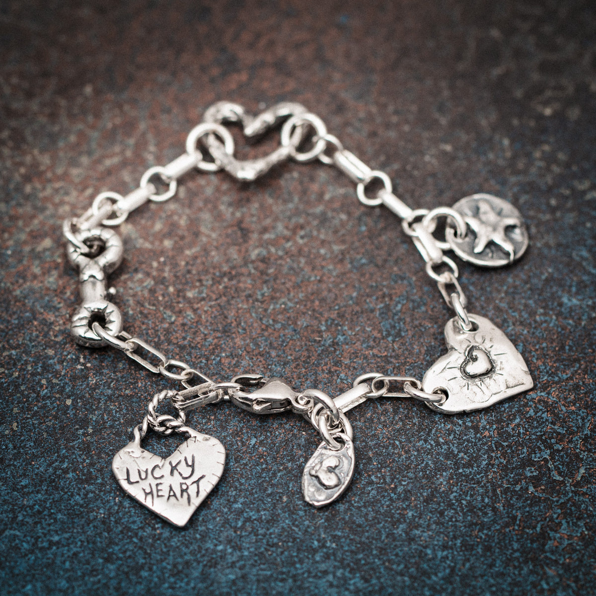 charm bracelet with silver charms