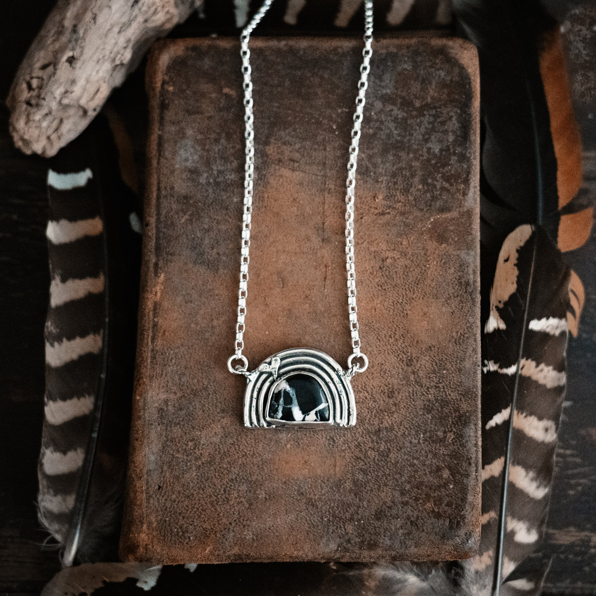 Black buffalo rainbow necklace