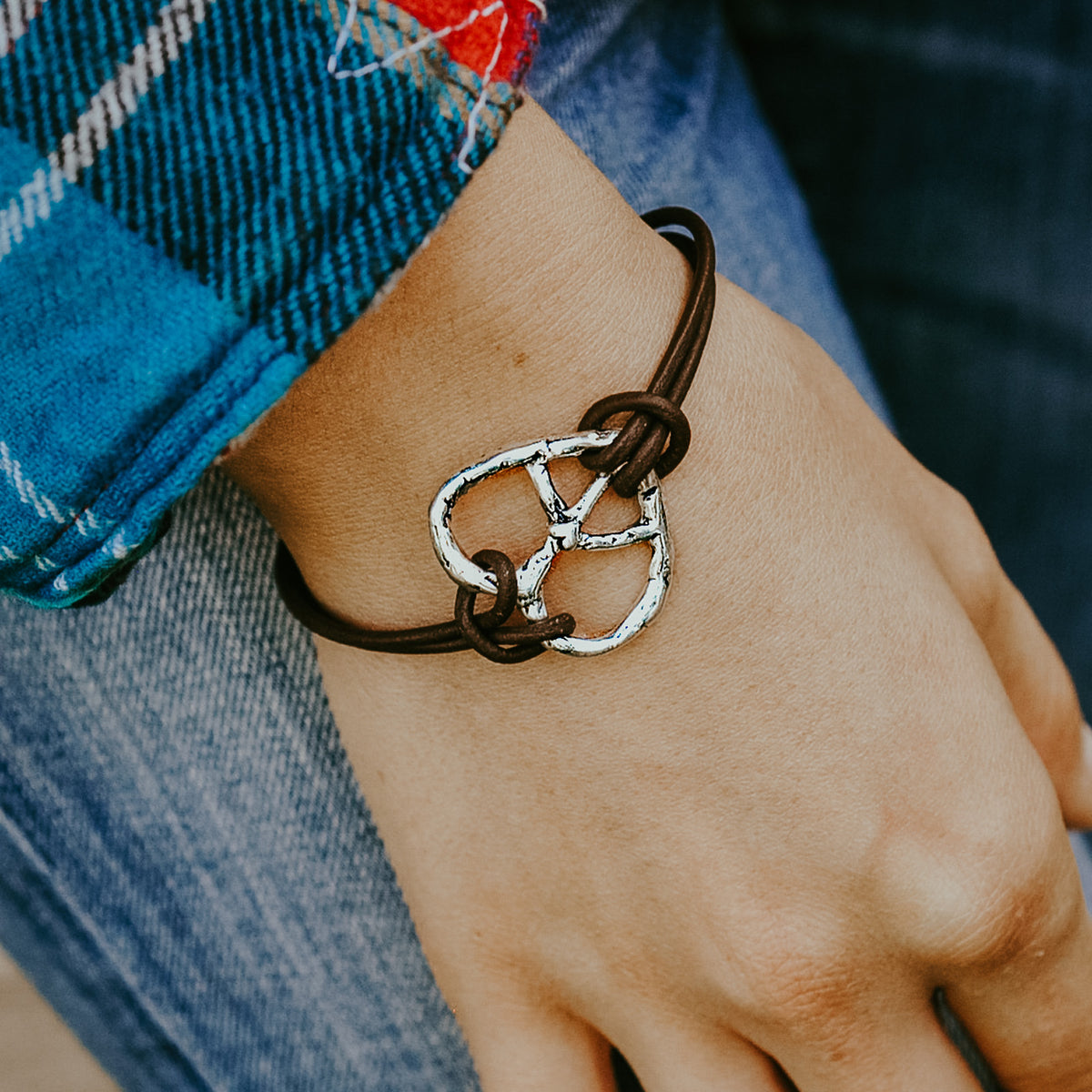 leather bracelet with heart peace sign