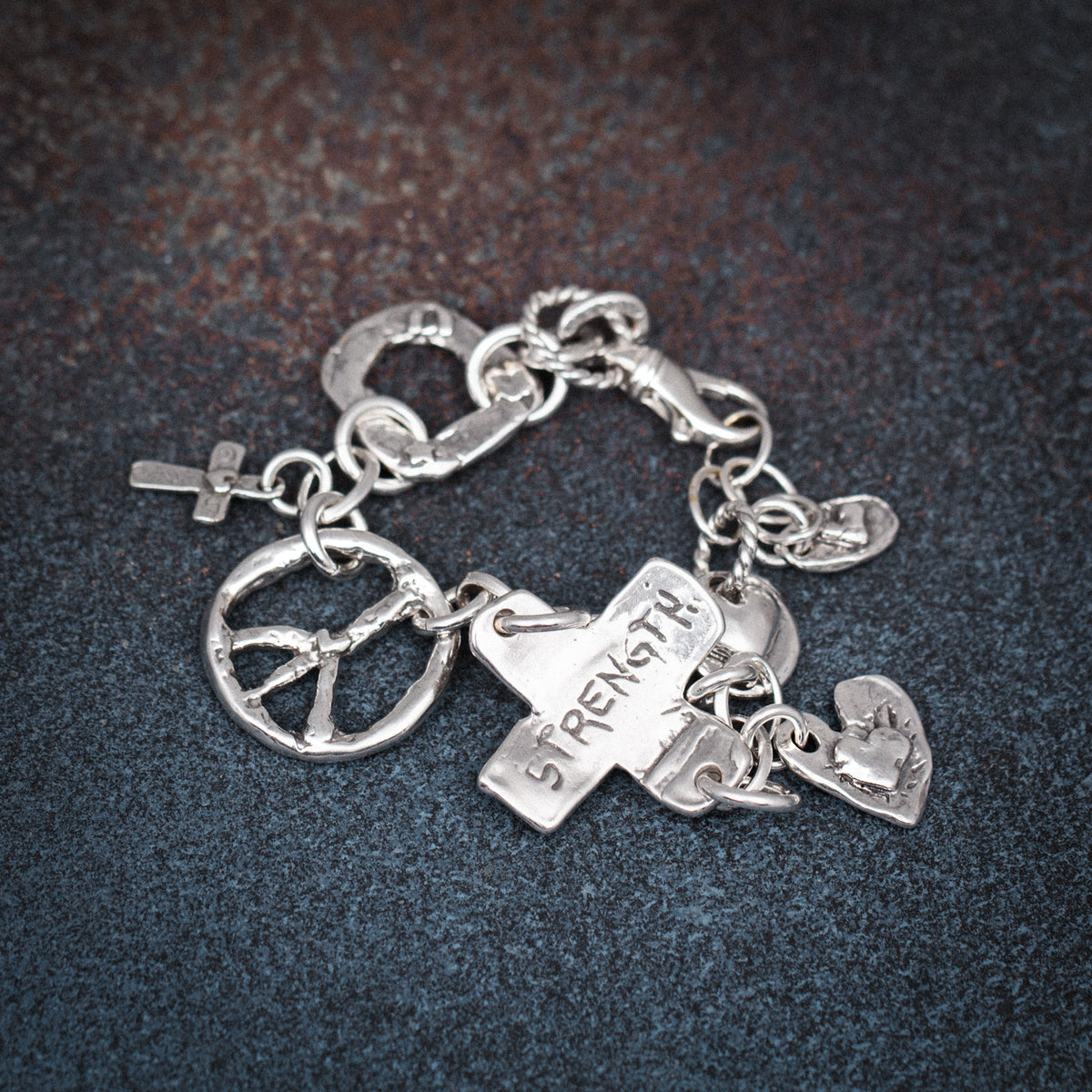 cross charm bracelet