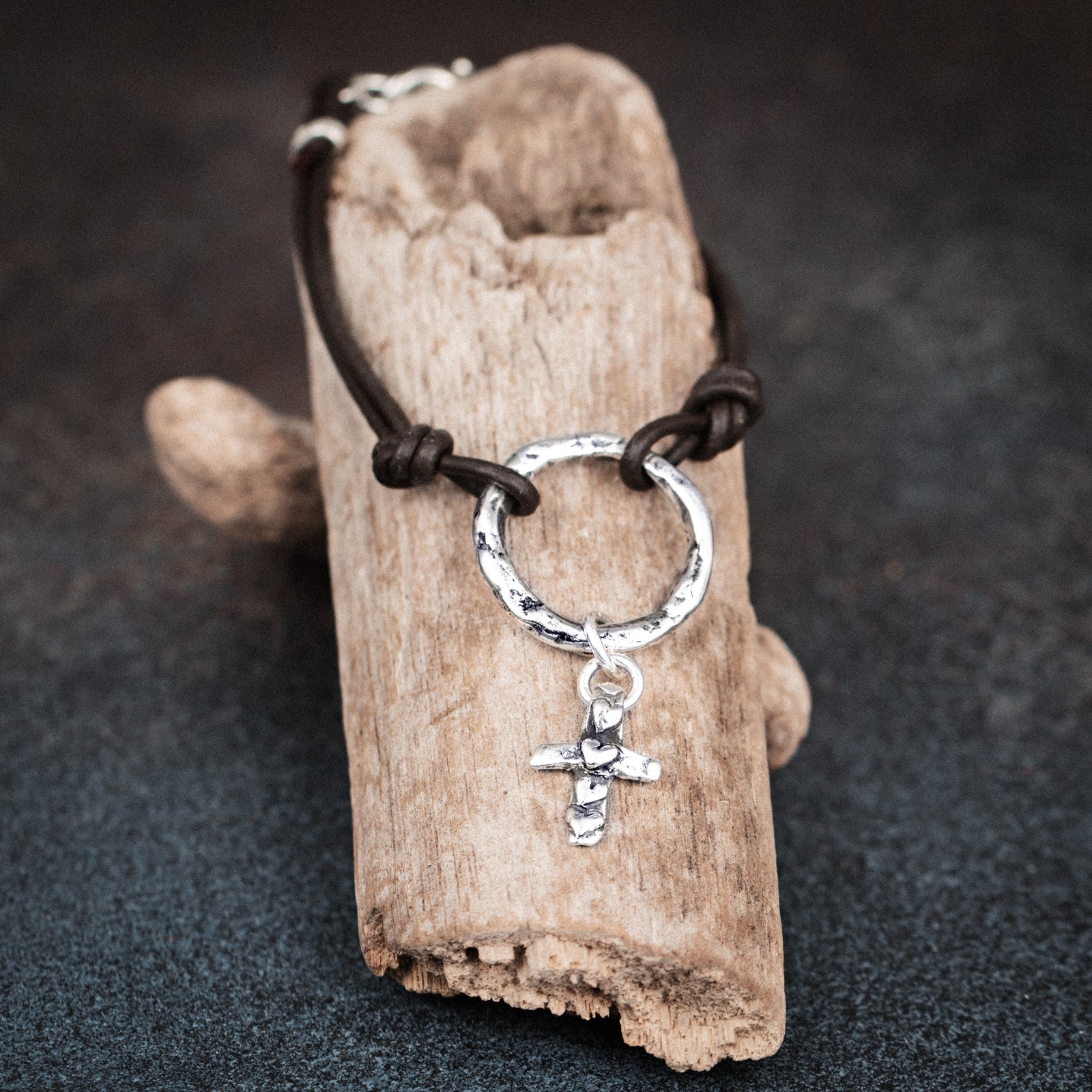 cross charm leather bracelet