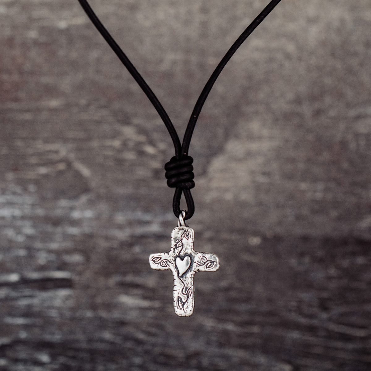 leather necklace with cross pendant