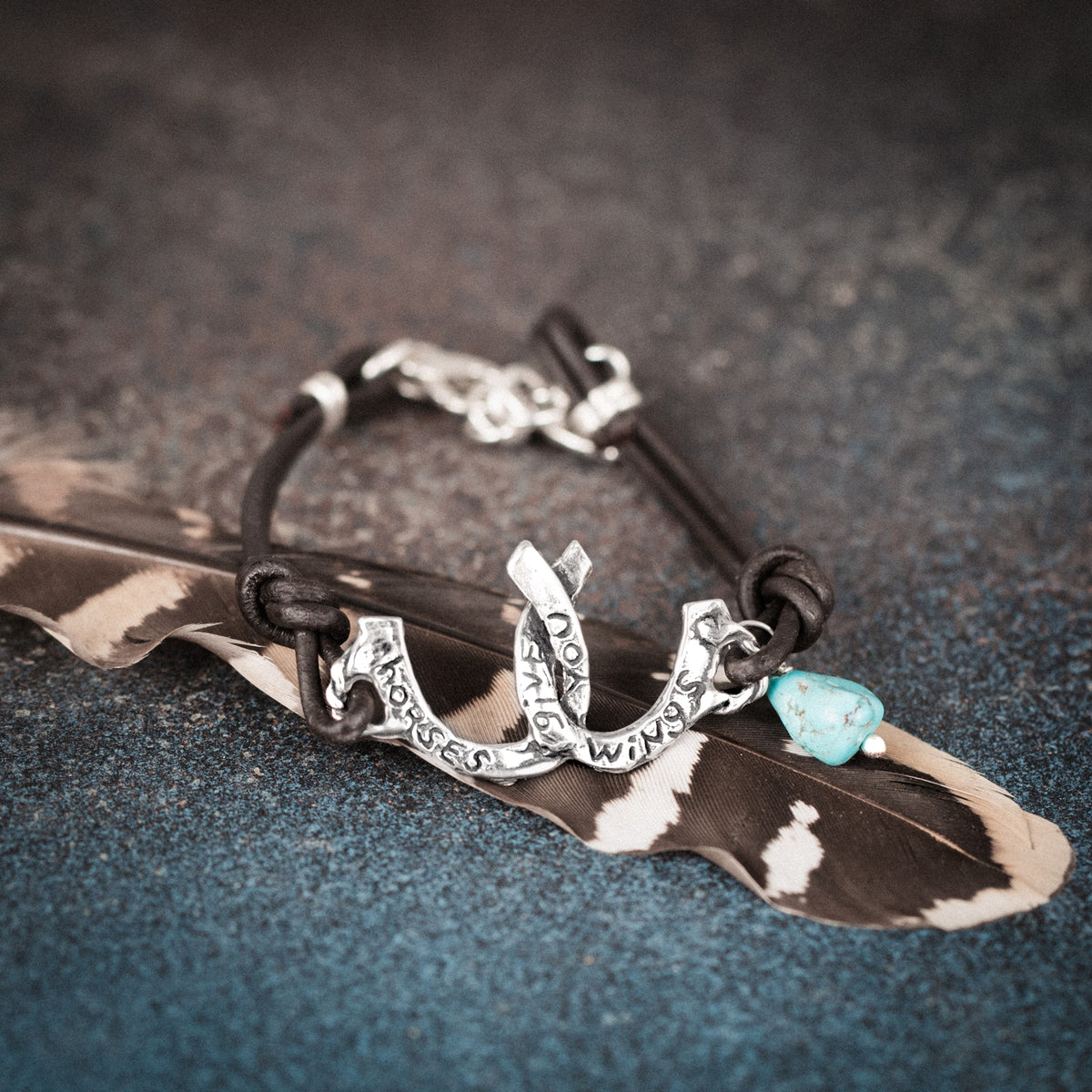 leather bracelet with silver horseshoes