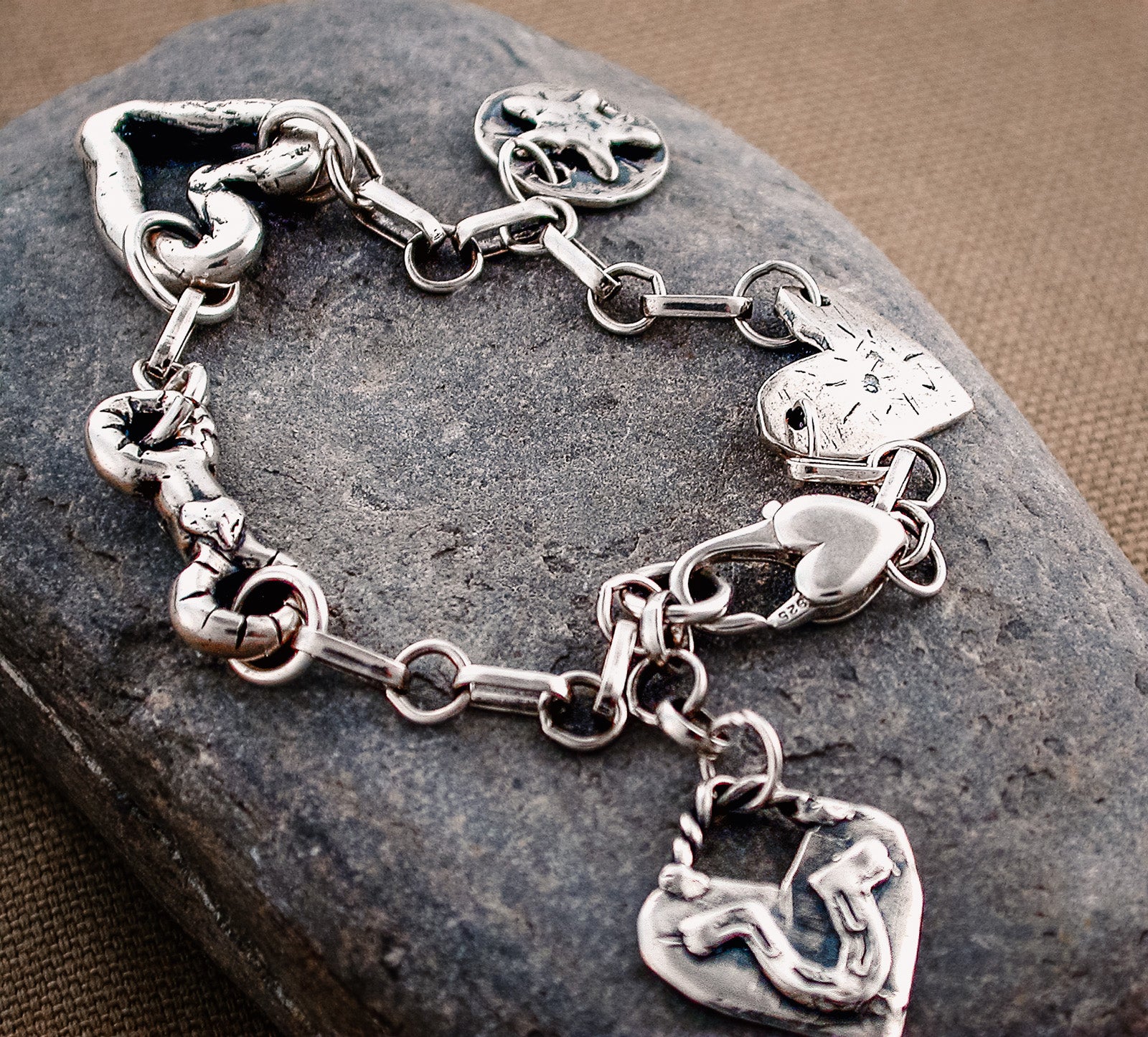 TheCharmWorks Sterling Silver Heart Clasp Charm Bracelet |  Jewellerybox.co.uk